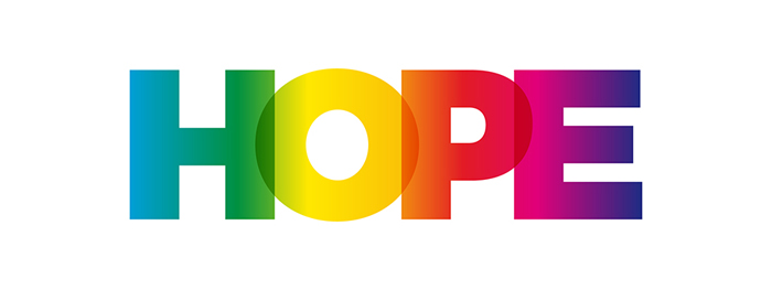 The word 'hope' in big block capital letters that shade through the various colours of the rainbow from left to right.