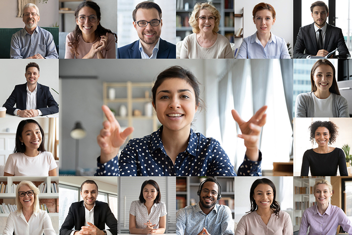 A collage of many faces all participating in a video conference.