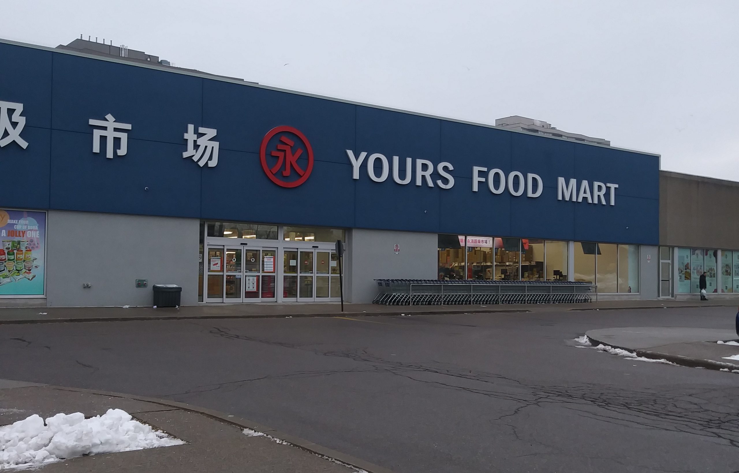 A photo of the exterior storefront of Yours Food Mart in the Bridlewood Mall in Toronto.