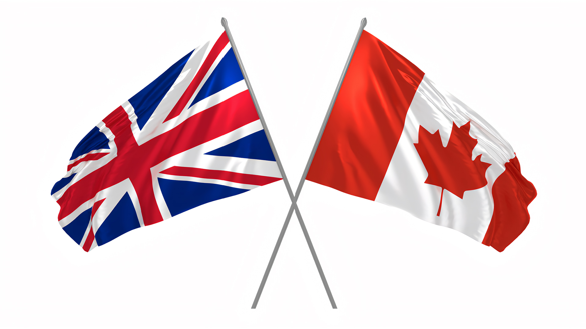 Two national flags are shown crossed against a plain white background. On the left is the United Kingdom flag, featuring a red, white, and blue Union Jack design. On the right is the Canadian flag, with two vertical red bars and a red maple leaf centered on a white field. The flags are displayed waving outward, symbolizing a connection or partnership between the UK and Canada.